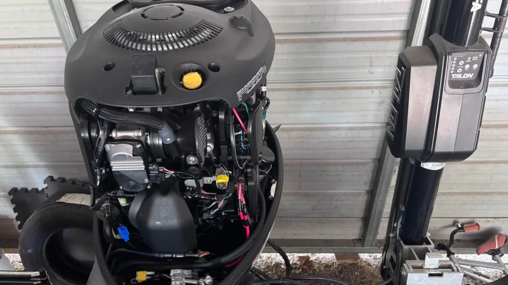 Yamaha 175 outboard motor cowling removed for service — Midwest boat repair guide